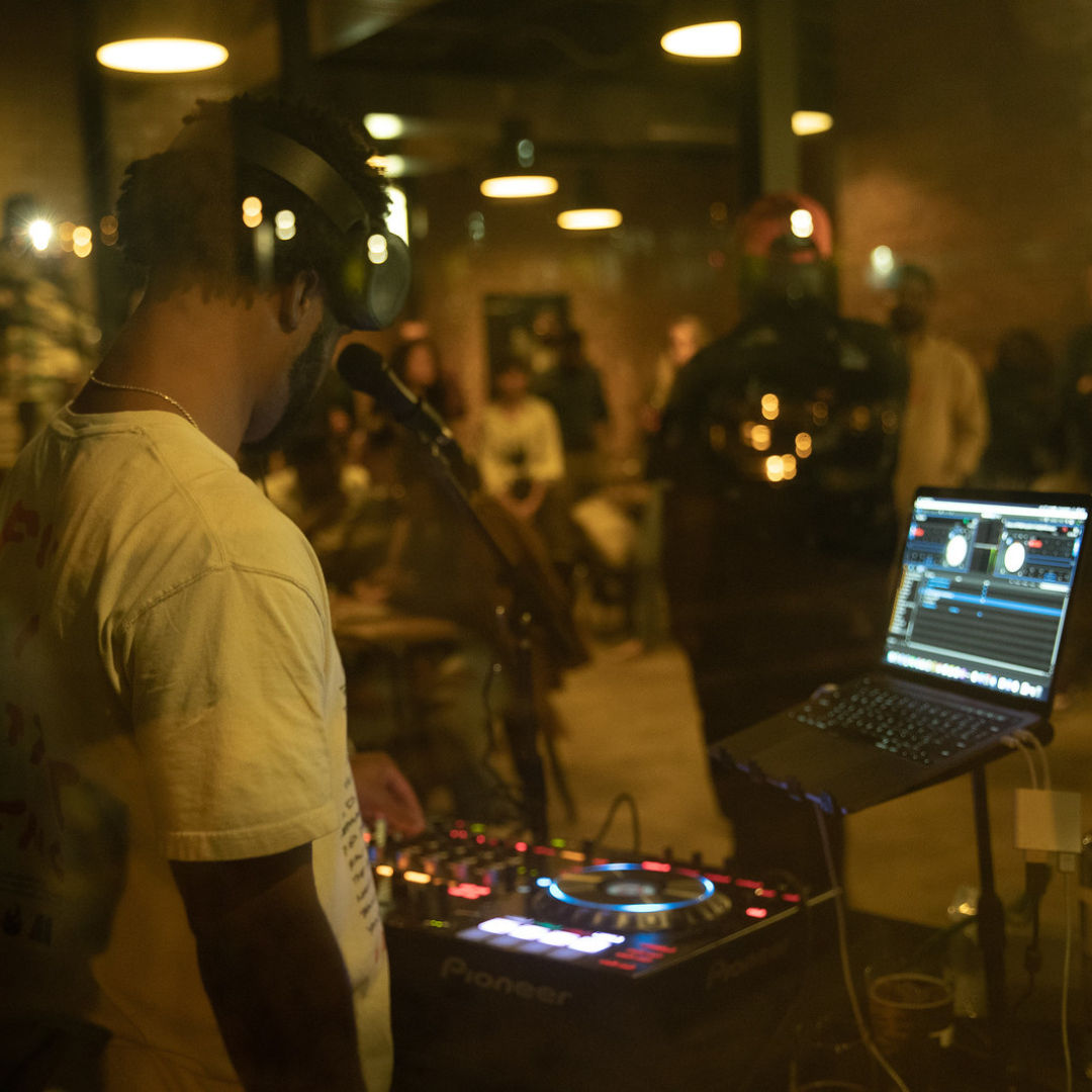 Spark Summit 2021, a DJ at his booth